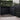 Screen With Envy black composite garden fence with decorative laser-cut trellis panels for privacy and style.